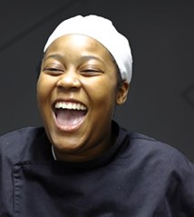 Smiling Swiss Hotel School culinary student